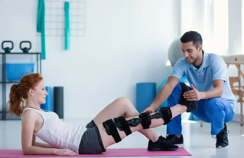 Woman having treatment to help muscle recovery Yorkshire after an injury